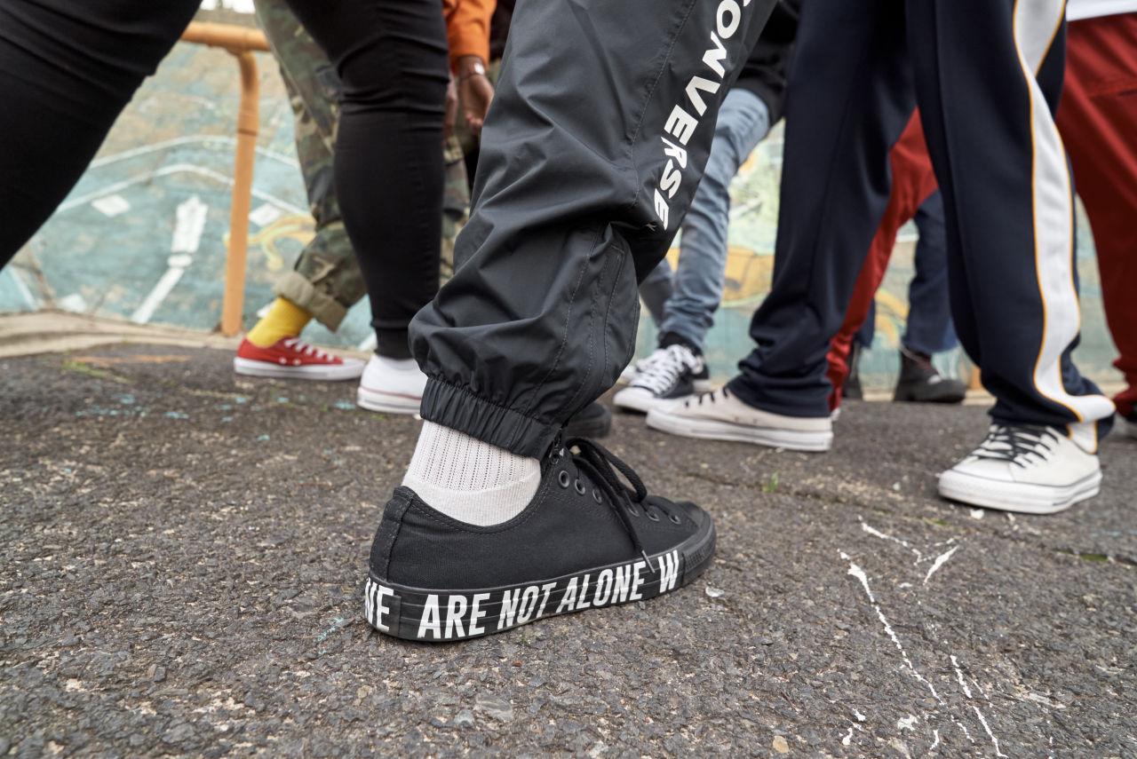 converse we are not alone black