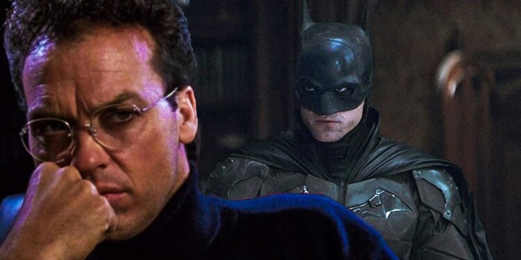 Michael Keaton's Batman looking at Robert Pattinson's Batman