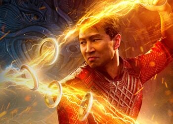 Shang-Chi (Simu Liu) commands the Ten Rings with golden lightning in a promotional image for Shang-Chi and the Legend of the Ten Rings