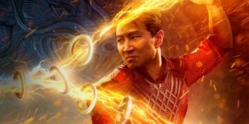 Shang-Chi (Simu Liu) commands the Ten Rings with golden lightning in a promotional image for Shang-Chi and the Legend of the Ten Rings