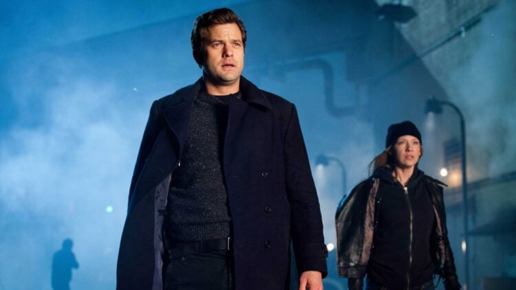 Peter Bishop walks through fog in a scene from Fringe