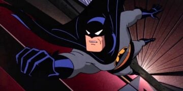 Batman hanging to the ledge in Batman The Animated Series