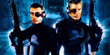 Jean-Claude Van Damme and Dolph Lundgren as reanimated soldiers in Universal Soldier, armed and facing forward against a blue sci-fi backdrop