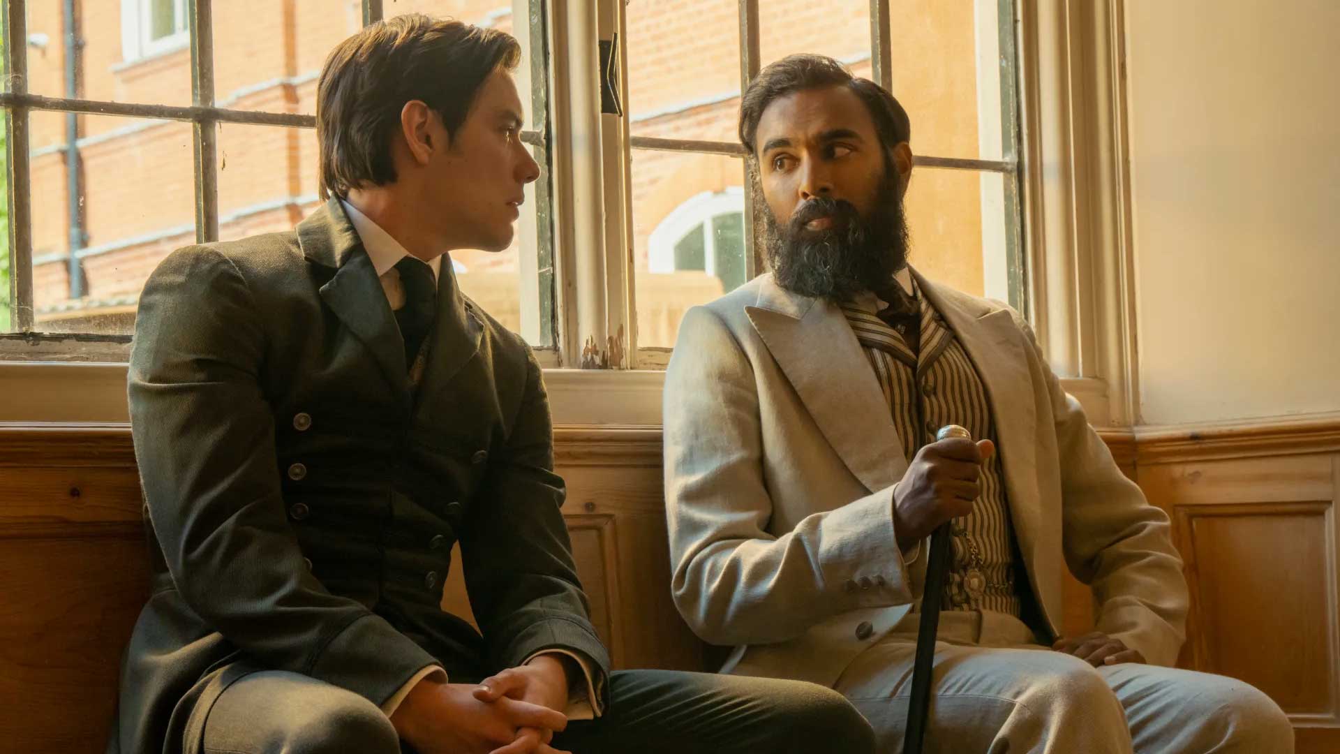 Louis Partridge as Tewkesbury and Himesh Patel as Dr. Watson in Enola Holmes 3