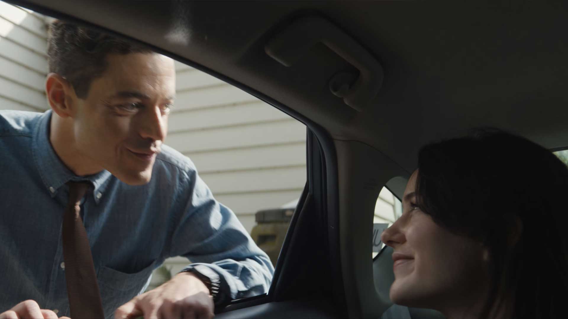 the amateur rami malek rachel brosnahan