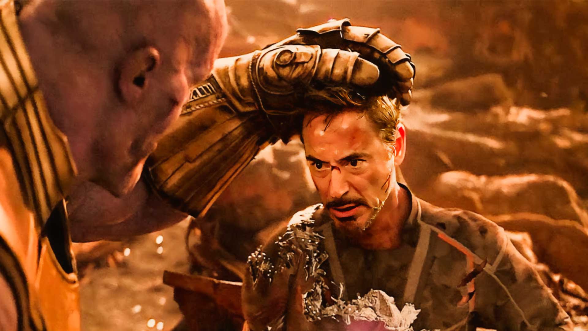 thanos hand on iron man head