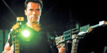 Arnold Schwarzenegger as John Kruger with electromagnetic rail guns in Eraser