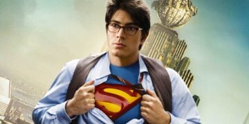 Brandon Routh as Clark Kent revealing Superman suit in Superman Returns