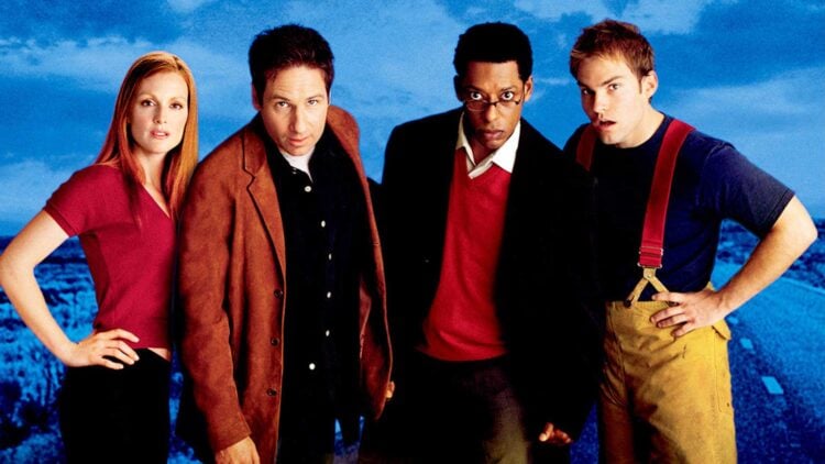 The cast of Evolution (2001) — Julianne Moore, David Duchovny, Orlando Jones, and Seann William Scott