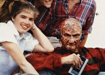 Freddy Krueger wearing the original red sweater with solid red sleeves on the set of A Nightmare on Elm Street 1984