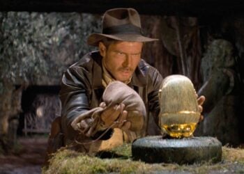 Harrison Ford as Indiana Jones attempts to swap the golden idol in Raiders of the Lost Ark (1981)