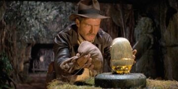 Harrison Ford as Indiana Jones attempts to swap the golden idol in Raiders of the Lost Ark (1981)