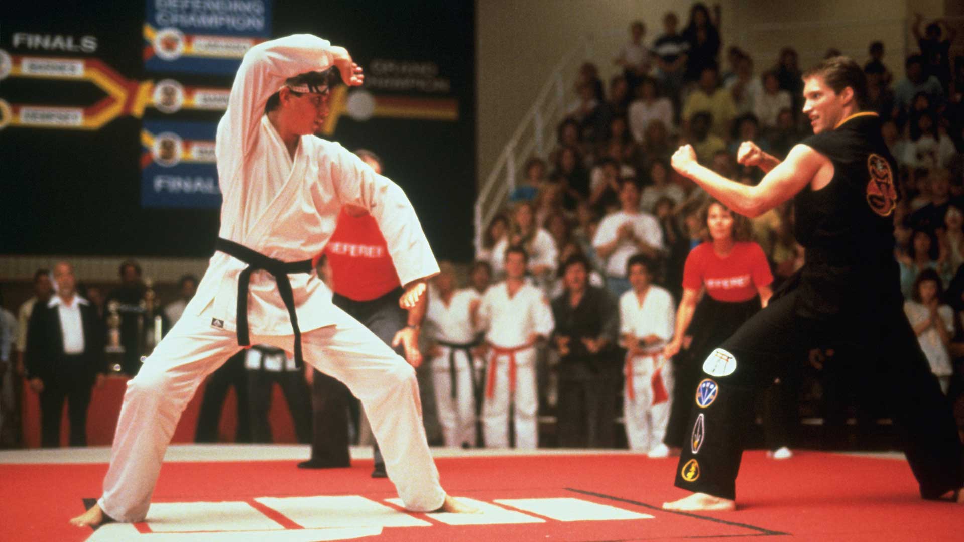 Sean Kanan as Mike Barnes and Ralph Macchio as Daniel LaRusso facing off during the finals in The Karate Kid Part III