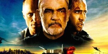 Nicolas Cage, Sean Connery, and Ed Harris in The Rock (1996), with Alcatraz exploding behind them at sunset