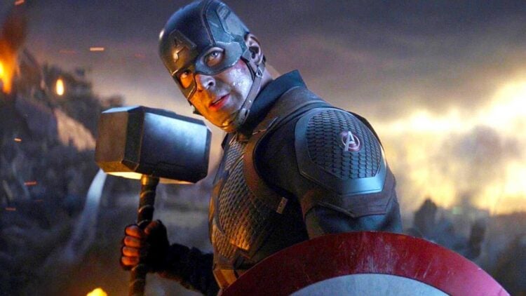 Chris Evans as Captain America wielding Thor's hammer Mjolnir in Avengers: Endgame