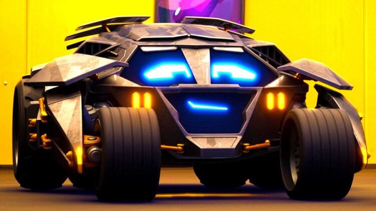 Close-up of the armored, bat-themed vehicle from Batwheels Season 3 with glowing blue eyes and orange lights, set against a yellow garage backdrop