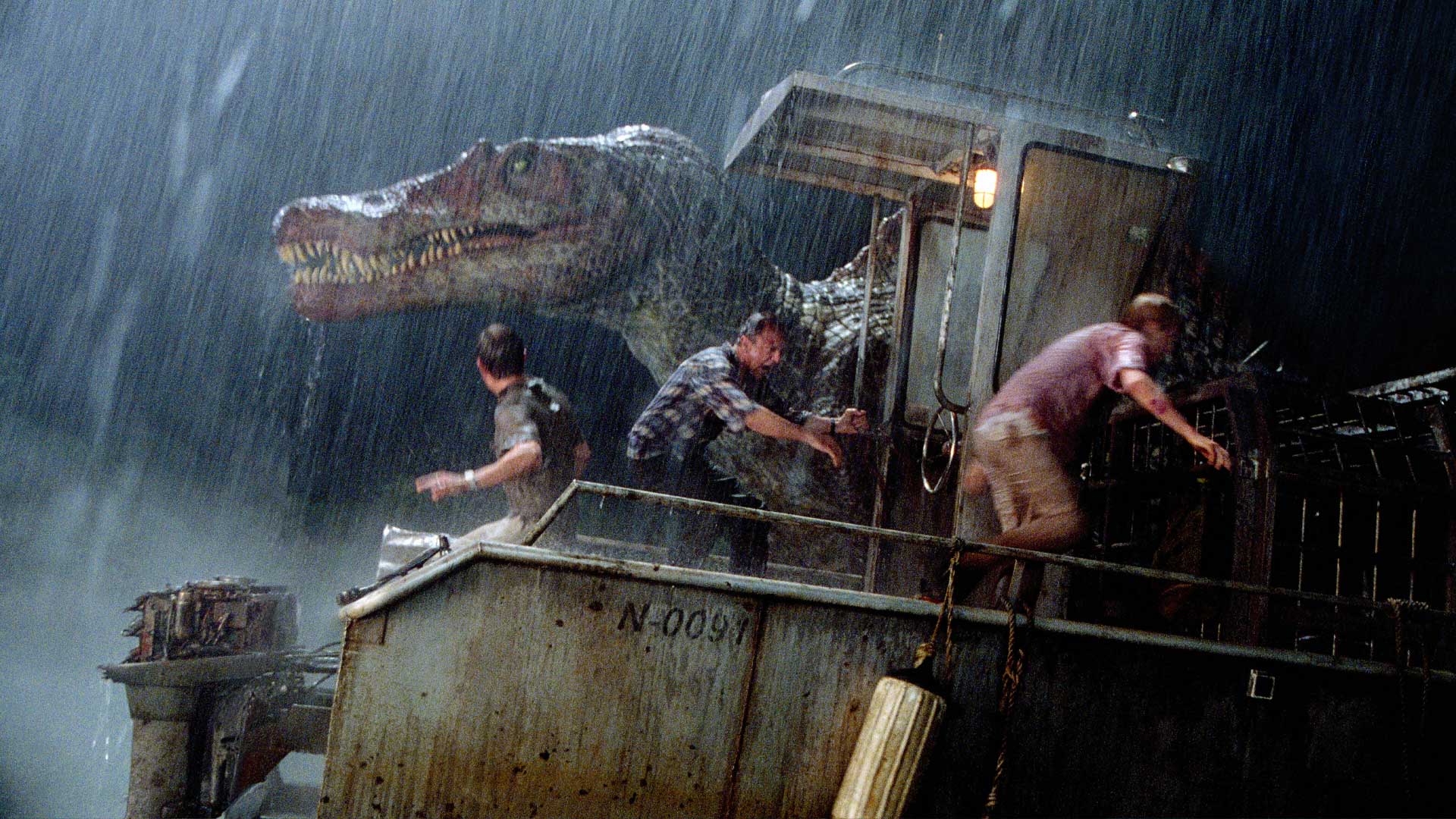 The Spinosaurus attacks a boat in a rain-soaked scene from Jurassic Park III