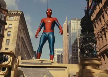 Spider-Man standing on top of a real tank during filming of the Spider-Man: Brand New Day tank chase