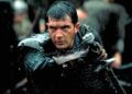 Antonio Banderas as Ahmad ibn Fadlan drawing a sword in the rain in The 13th Warrior (1999)