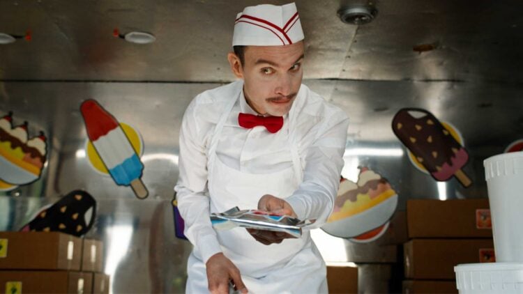 Ari Millen as the Ice Cream Man staring menacingly from inside his truck in Eli Roth's Ice Cream Man