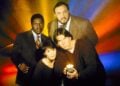 Promotional cast photo of Sliders featuring Quinn Mallory, Wade Welles, Professor Arturo, and Rembrandt Brown
