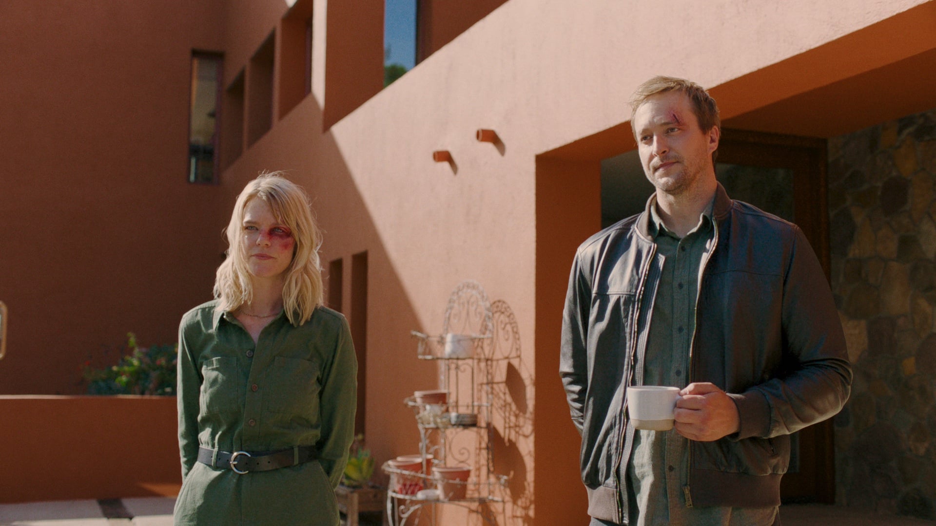 Vince and Claire looking bloodied in The Exit State